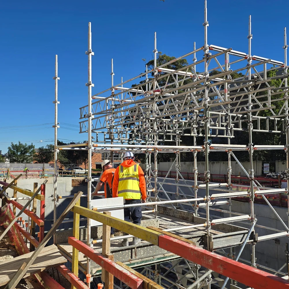Aluminium scaffold tower set up inside a finished, occupied space