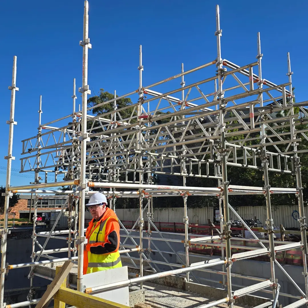 Mortlake, NSW — "Engineered For Efficiency. Built For Productivity." · Crane-lift aluminium stair tower