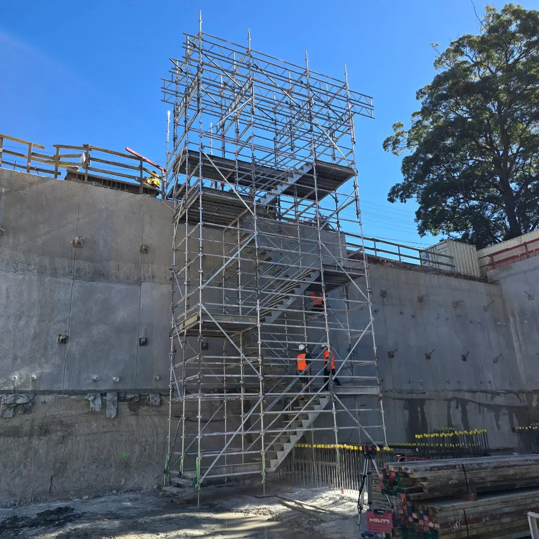 Mortlake, NSW — "Engineered For Efficiency. Built For Productivity." · Crane-lift aluminium stair tower