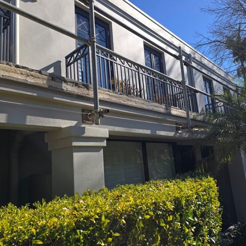 Cantilevered scaffold and edge protection for a balcony remedial project in Randwick, NSW