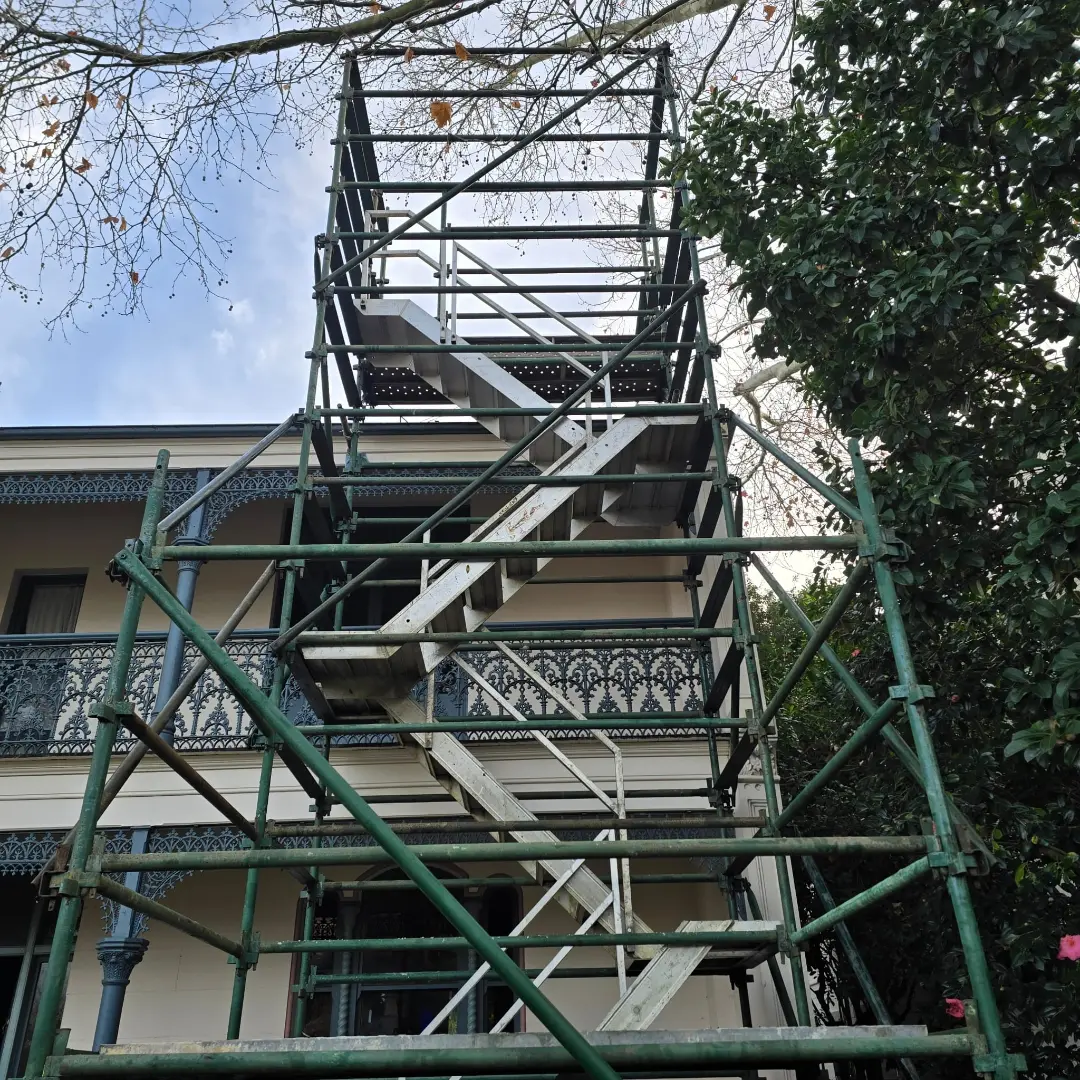 Alloy stair access tower installed for a heritage roof repair in Glebe