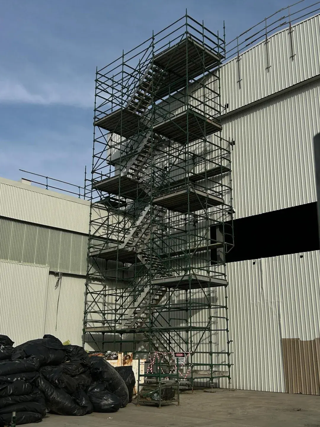 Aluminium scaffold access for a factory roof replacement in Moorebank, NSW