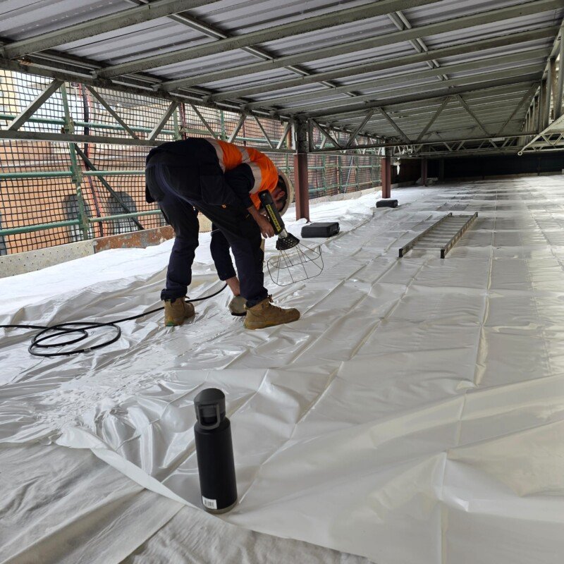 Central Station - Industrial Shrink Wrap Encapsulation — Commercial/industrial building · Roof-level shrink wrap encapsulation