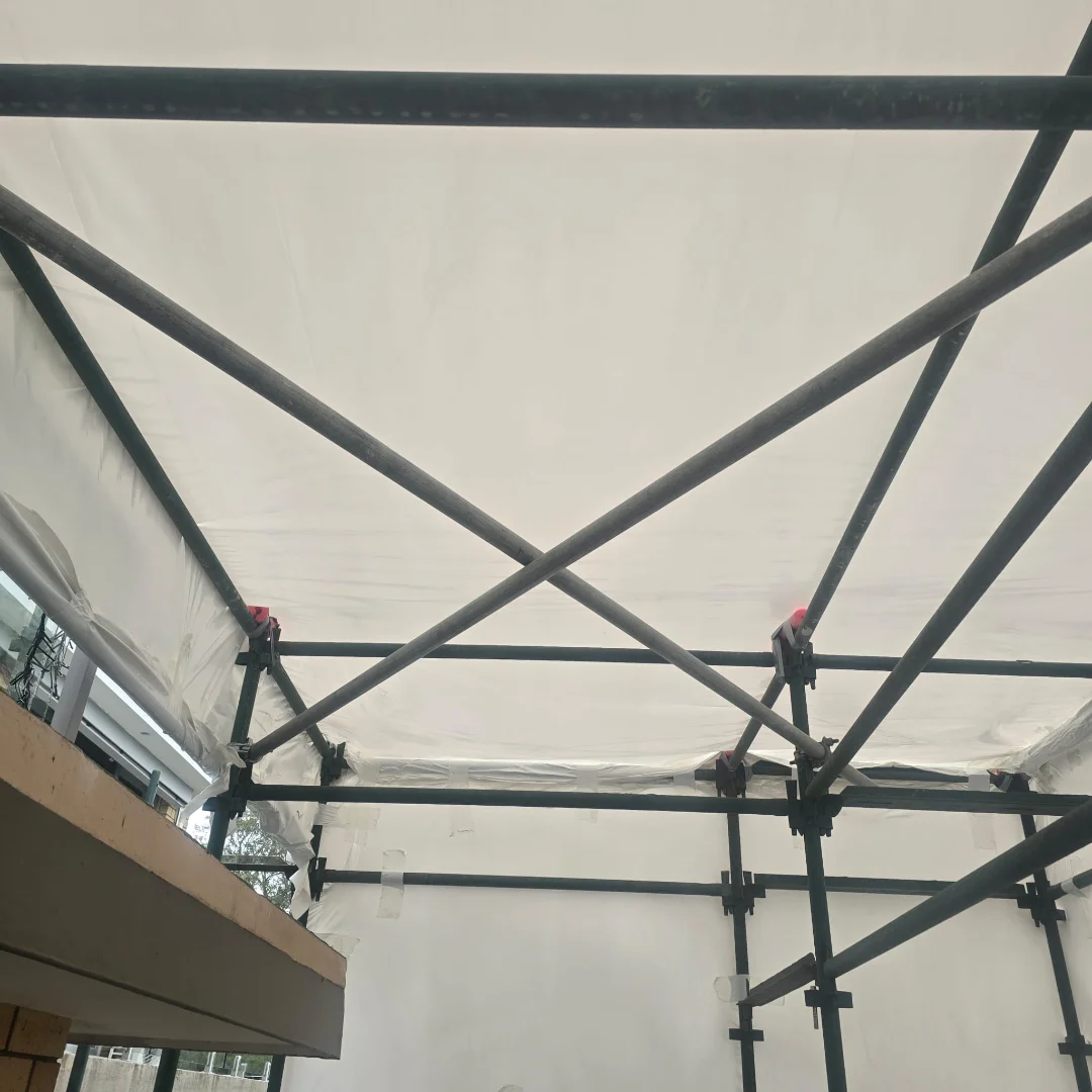 Mosman, NSW — Shrink Wrap Encapsulation — Rain doesn't stop the job unless you let it. · Shrink wrap encapsulation & temporary roof system