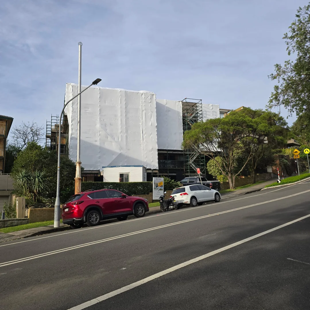Mosman, NSW — Shrink Wrap Encapsulation — Rain doesn't stop the job unless you let it. · Shrink wrap encapsulation & temporary roof system