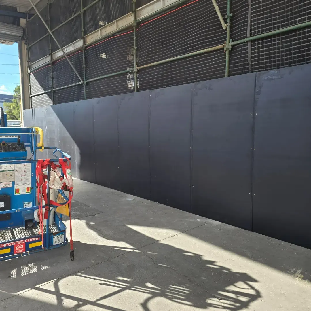 Kwik Stage scaffold and hoarding on an operational factory site in Wetherill Park
